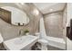 Neutral bathroom with large tile, a tub and shower combination, and a modern sink at 31 E Bishop Dr, Tempe, AZ 85282