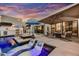 Beautiful outdoor pool area featuring lounge chairs, umbrellas, and scenic views at 31 E Bishop Dr, Tempe, AZ 85282