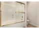 Bathroom featuring a tub, shower, and glass block accent at 333 N Pennington Dr # 63, Chandler, AZ 85224