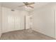 Bedroom featuring neutral carpet and a closet with sliding doors at 333 N Pennington Dr # 63, Chandler, AZ 85224