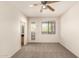 Bedroom featuring a ceiling fan, carpet, and an exterior door at 333 N Pennington Dr # 63, Chandler, AZ 85224
