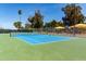 View of green and blue tennis court, perfect for sports enthusiasts at 333 N Pennington Dr # 63, Chandler, AZ 85224