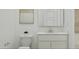 Bathroom featuring toilet and vanity sink, accentuated by modern hardware and framed artwork at 3783 E Gold Mountain Ave, San Tan Valley, AZ 85143