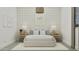 Bedroom with a neutral palette, golf-themed artwork, and soft lighting for a calming and stylish retreat at 3783 E Gold Mountain Ave, San Tan Valley, AZ 85143