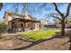 Lush backyard with a covered patio, outdoor furniture, and a pool, perfect for entertaining and relaxing at 4617 E Montgomery Rd, Cave Creek, AZ 85331