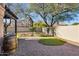 Private backyard with a putting green and gravel landscaping, perfect for outdoor relaxation at 4617 E Montgomery Rd, Cave Creek, AZ 85331