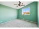 Bedroom features carpet, ceiling fan, and a window at 4617 E Montgomery Rd, Cave Creek, AZ 85331