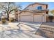 Inviting home with a spacious three-car garage and neutral exterior at 4617 E Montgomery Rd, Cave Creek, AZ 85331