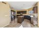 Stylish kitchen with dark wood cabinets, granite countertops, and stainless steel appliances at 4617 E Montgomery Rd, Cave Creek, AZ 85331