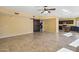 Bright, open living room with tile floors and a rustic sliding barn door to the right at 4617 E Montgomery Rd, Cave Creek, AZ 85331