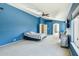 Spacious main bedroom with carpet, ceiling fan, television, and sitting area at 4617 E Montgomery Rd, Cave Creek, AZ 85331