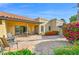 Expansive backyard with a covered patio, outdoor seating, and lush landscaping at 5505 E Mclellan Rd # 41, Mesa, AZ 85205