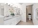 Bathroom featuring dual sinks, granite countertops, and a separate toilet room at 5505 E Mclellan Rd # 41, Mesa, AZ 85205