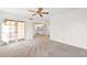 Bright, spacious bedroom with mirrored closets, glass door to balcony and neutral carpet at 5505 E Mclellan Rd # 41, Mesa, AZ 85205
