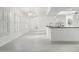 Bright kitchen with white cabinets, shuttered windows, and a ceiling fan at 5742 W Shannon St, Chandler, AZ 85226
