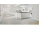 Spacious kitchen featuring white cabinets, granite countertops, and modern appliances at 5742 W Shannon St, Chandler, AZ 85226