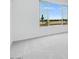 Bright bedroom showcases a large window with desert and neighborhood views and plush neutral carpeting at 5779 N 207Th Ave, Buckeye, AZ 85396