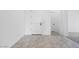Inviting entryway featuring tile flooring and a white front door at 5779 N 207Th Ave, Buckeye, AZ 85396
