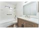 Bathroom with a white marble-tiled shower and a neutral-tone vanity at 6262 E Brown Rd # 30, Mesa, AZ 85205