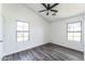Bright bedroom featuring natural light from two large windows at 6262 E Brown Rd # 30, Mesa, AZ 85205
