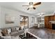 Staged living room showcasing dining area, neutral colors, and modern decor at 6262 E Brown Rd # 30, Mesa, AZ 85205