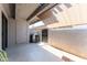 Enclosed patio featuring an AC unit, small gate, and tan sun-blocking awning at 6262 E Brown Rd # 30, Mesa, AZ 85205