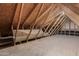 View of attic with wood beams and flooring at 654 W Natal Cir, Mesa, AZ 85210