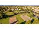 Aerial view of a neighborhood park with basketball, volleyball and playground areas at 654 W Natal Cir, Mesa, AZ 85210