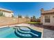 Backyard pool with tile steps, beautiful backyard, and desert landscaping at 654 W Natal Cir, Mesa, AZ 85210