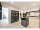 Expansive walk-in closet featuring shelving system and island at 670 E Woburn Ln, Phoenix, AZ 85085