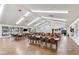Spacious community center for events and gatherings, complete with tables, chairs, and a large TV at 6960 W Peoria Ave # 29B, Peoria, AZ 85345