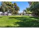 Expansive green space for activities and relaxation, set amidst lush greenery and well-maintained landscaping at 6960 W Peoria Ave # 29B, Peoria, AZ 85345
