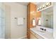Bathroom featuring tile countertops, vanity with drawers, and tile-enclosed shower at 7220 E Mary Sharon Dr # 116, Scottsdale, AZ 85266