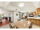Bright kitchen with dining area featuring stainless steel appliances and a breakfast nook at 7220 E Mary Sharon Dr # 116, Scottsdale, AZ 85266