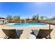 Stunning pool area with ample space for relaxation and fun at 7220 E Mary Sharon Dr # 116, Scottsdale, AZ 85266