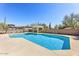 Private pool with desert plants in well-maintained backyard at 7220 E Mary Sharon Dr # 116, Scottsdale, AZ 85266