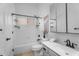 Bright bathroom featuring a shower and tub combo, toilet, and vanity at 7544 E Sierra Morena Cir, Mesa, AZ 85207