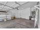 Spacious garage with shelving units and a water heater, perfect for storage at 7544 E Sierra Morena Cir, Mesa, AZ 85207
