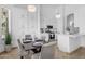 Elegant kitchen and dining area showcasing white cabinets, stainless steel appliances, and pendant lighting at 7544 E Sierra Morena Cir, Mesa, AZ 85207