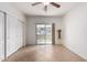 Bedroom with tile floor and slider door with a patio view at 7726 E Baseline Rd # 134, Mesa, AZ 85209