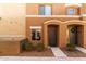Attractive home exterior showcasing a well-manicured lawn and appealing architectural details at 7726 E Baseline Rd # 134, Mesa, AZ 85209