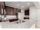 Stylish kitchen with granite countertops, stainless steel appliances, and ample cabinet space at 7726 E Baseline Rd # 134, Mesa, AZ 85209