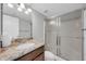 Bathroom features a granite countertop, single sink, and glass-enclosed shower at 913 W Juanita Ave, Gilbert, AZ 85233