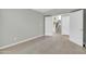 Neutral bedroom featuring tile flooring and double door access to the entryway at 913 W Juanita Ave, Gilbert, AZ 85233