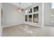 Open living room with high ceilings and large windows that allow lots of natural light at 913 W Juanita Ave, Gilbert, AZ 85233