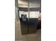 Side-by-side stainless steel refrigerator with water and ice dispenser at 913 W Juanita Ave, Gilbert, AZ 85233