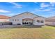 A large backyard with a covered patio provides an ideal space for outdoor dining and leisure at 9626 W Bajada Rd, Peoria, AZ 85383