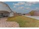 This backyard has a paved patio and covered lounge area at 9626 W Bajada Rd, Peoria, AZ 85383