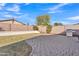 A private backyard features a paved patio area, a green lawn, and a BBQ grill, perfect for outdoor entertaining at 9626 W Bajada Rd, Peoria, AZ 85383