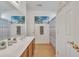 Bathroom with dual vanity, framed mirror, and shower with curtain at 9626 W Bajada Rd, Peoria, AZ 85383